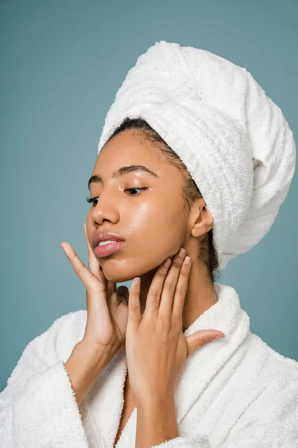 women doing massage on face
